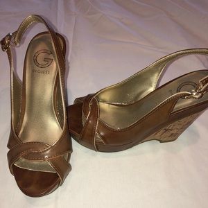 Size 6.5 Guess 4” wedge heels. Taupe/gold accents